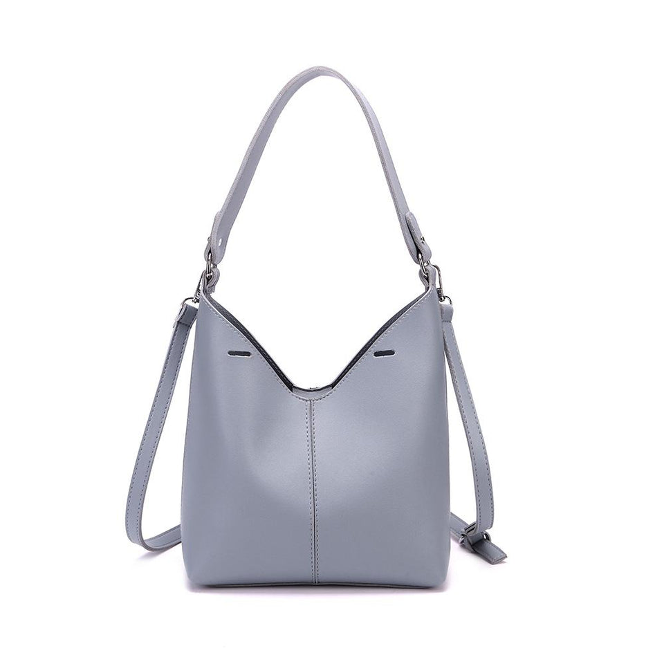 Cut-out sculptural faux leather 2-in-1 bag in Slate blue