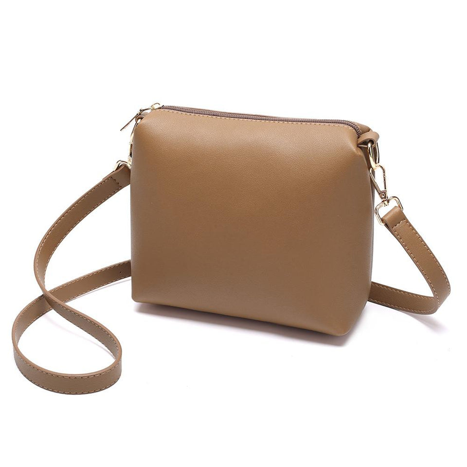 Belted flapover faux leather 2-in-1 bag in Tan